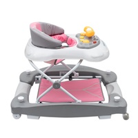 Dětské chodítko s houpačkou a silikonovými kolečky Baby Mix růžové